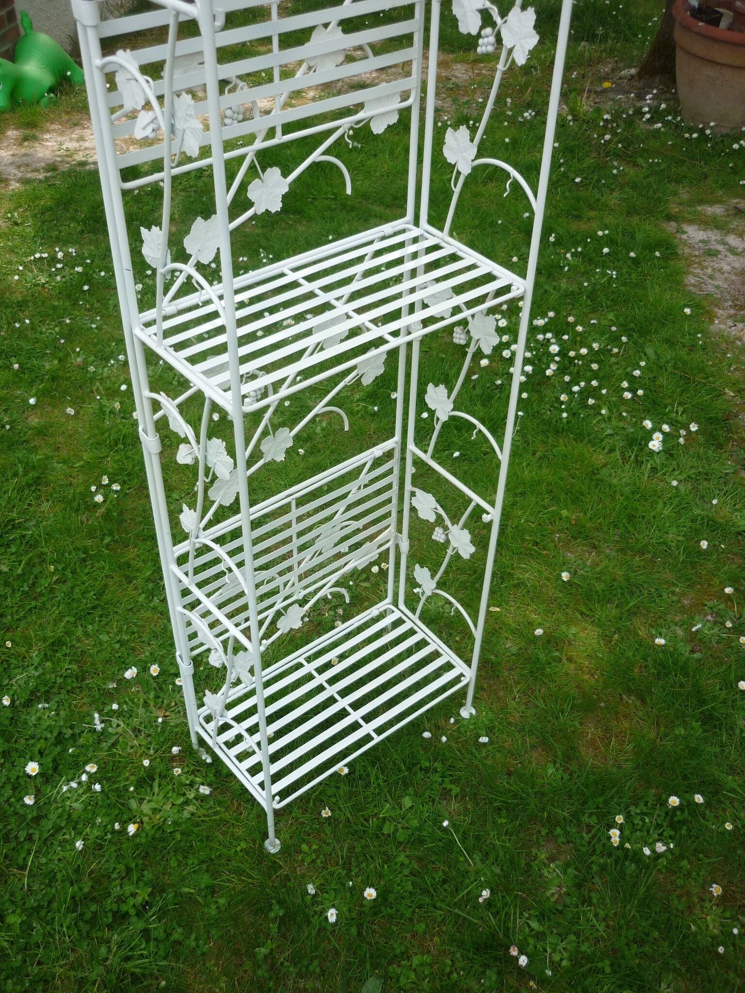 Folding white wrought iron shelf