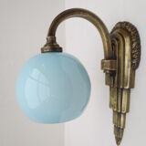 Art deco wall lamp in brass and soft blue opaline globe