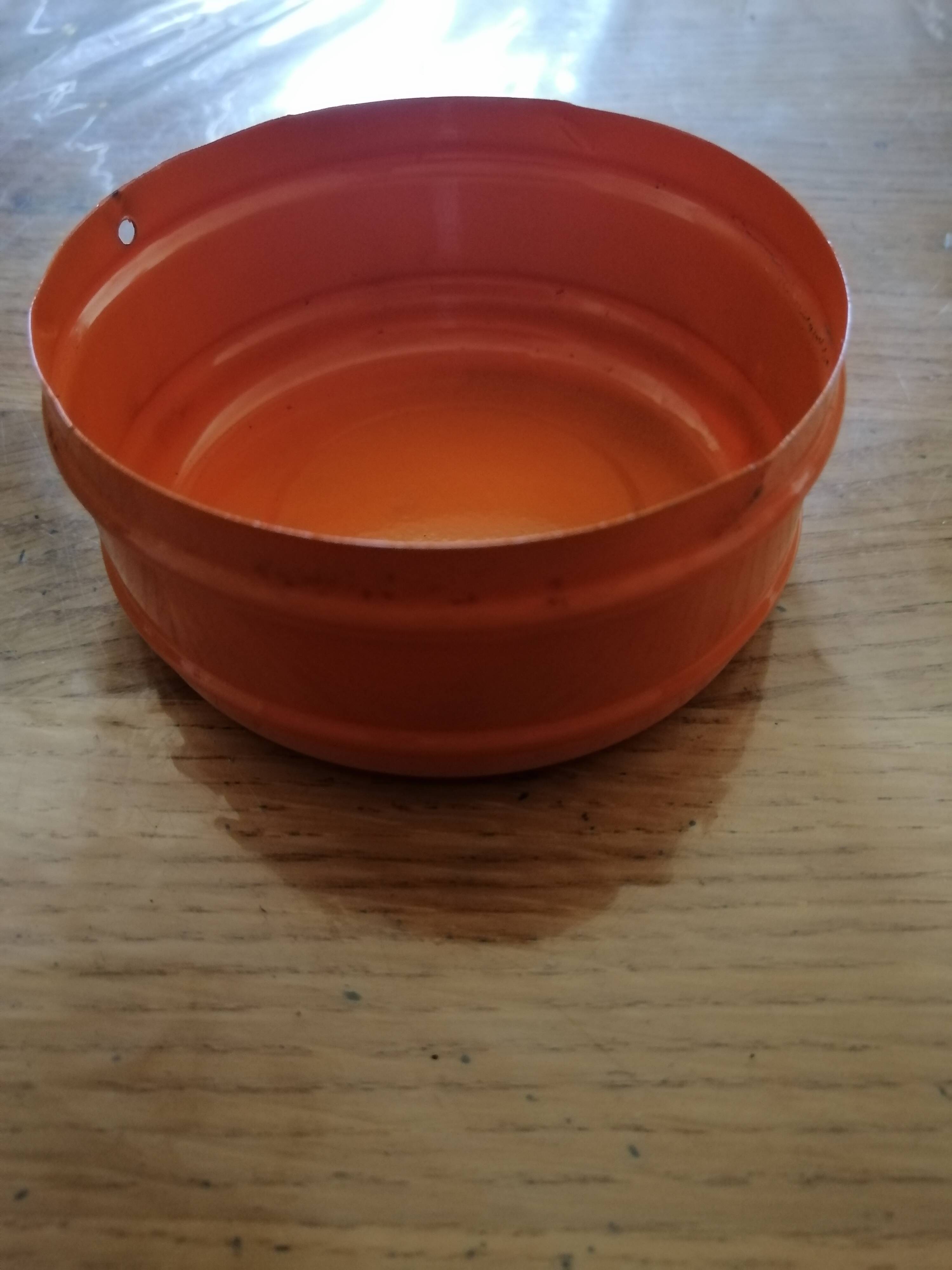Vintage orange rotating ashtray