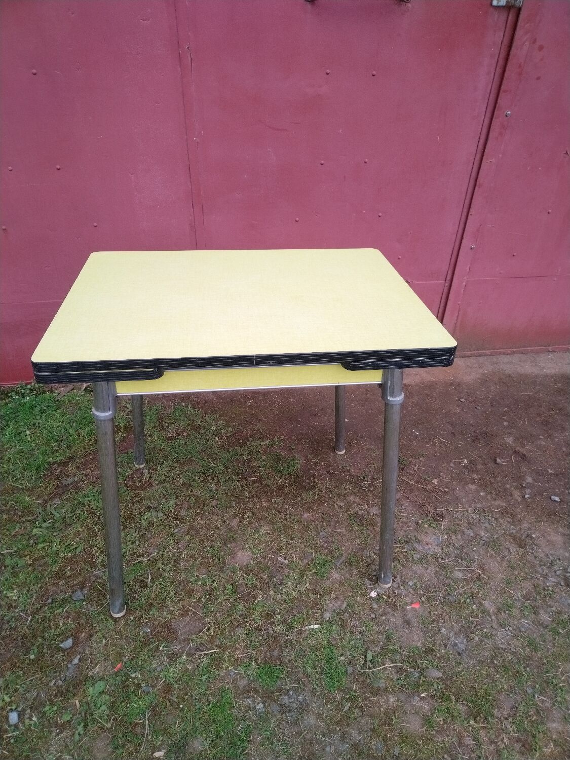 Yellow formica table with extensions