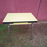Yellow formica table with extensions