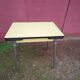 Yellow formica table with extensions