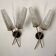 Pair of wall sconces from the 60s, gold metal and tulips.