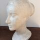 Platre jeune femme au chignon