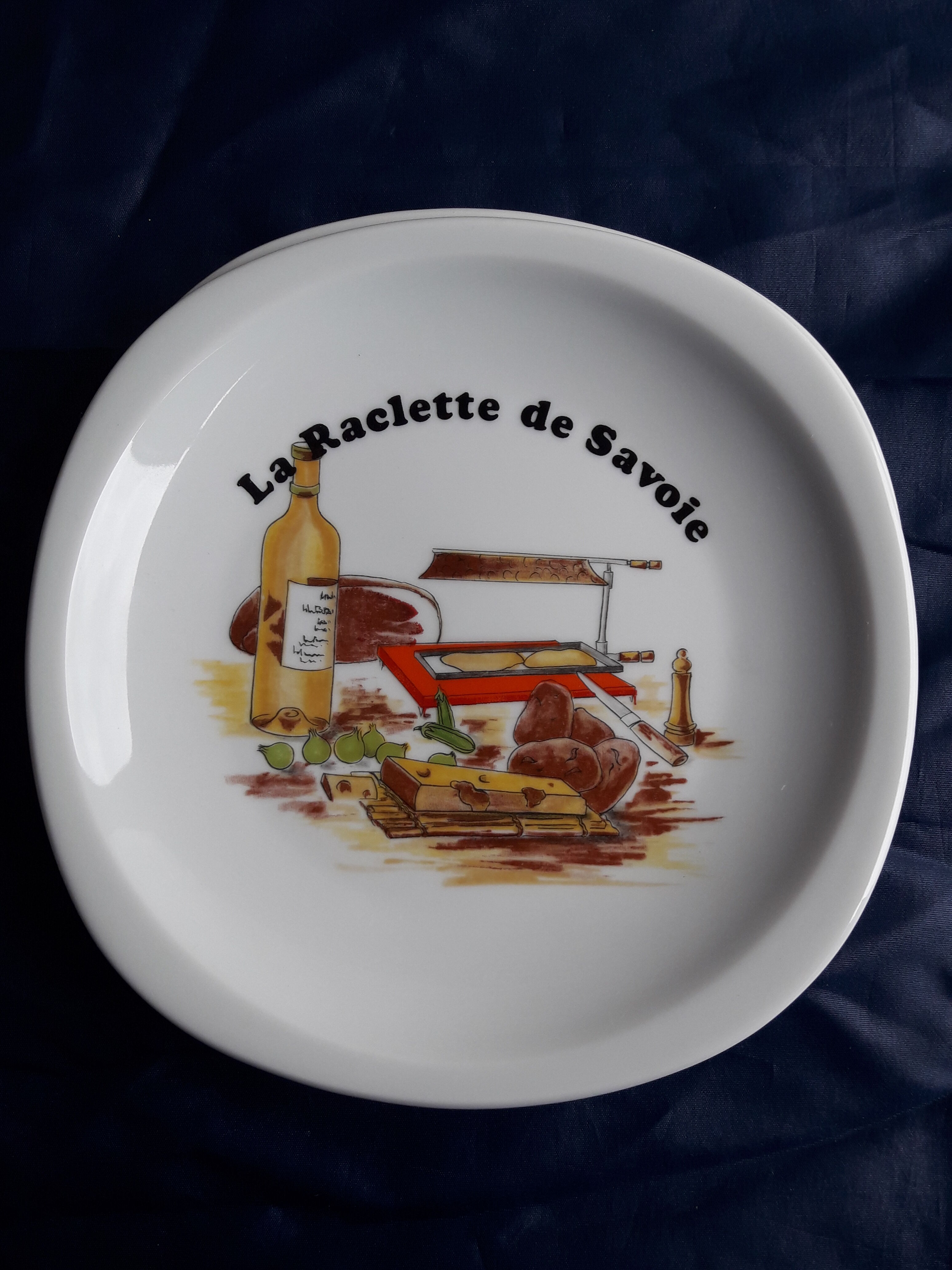 Lourioux porcelain raclette service created by Philippe Deshoulières