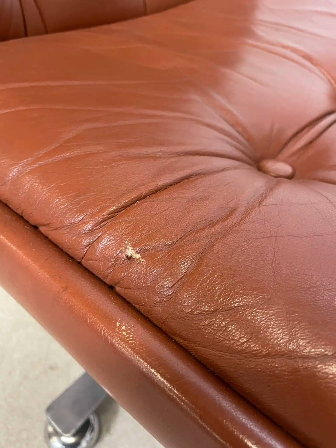 Pair of brown leather armchairs 1980