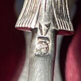 Engraved sugar tongs in solid silver with Minerva hallmark and lion's claws