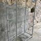 Shelf on chromed metal legs and glass tops 1970
