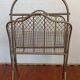Brass magazine rack in neo-classical style, 20th century.