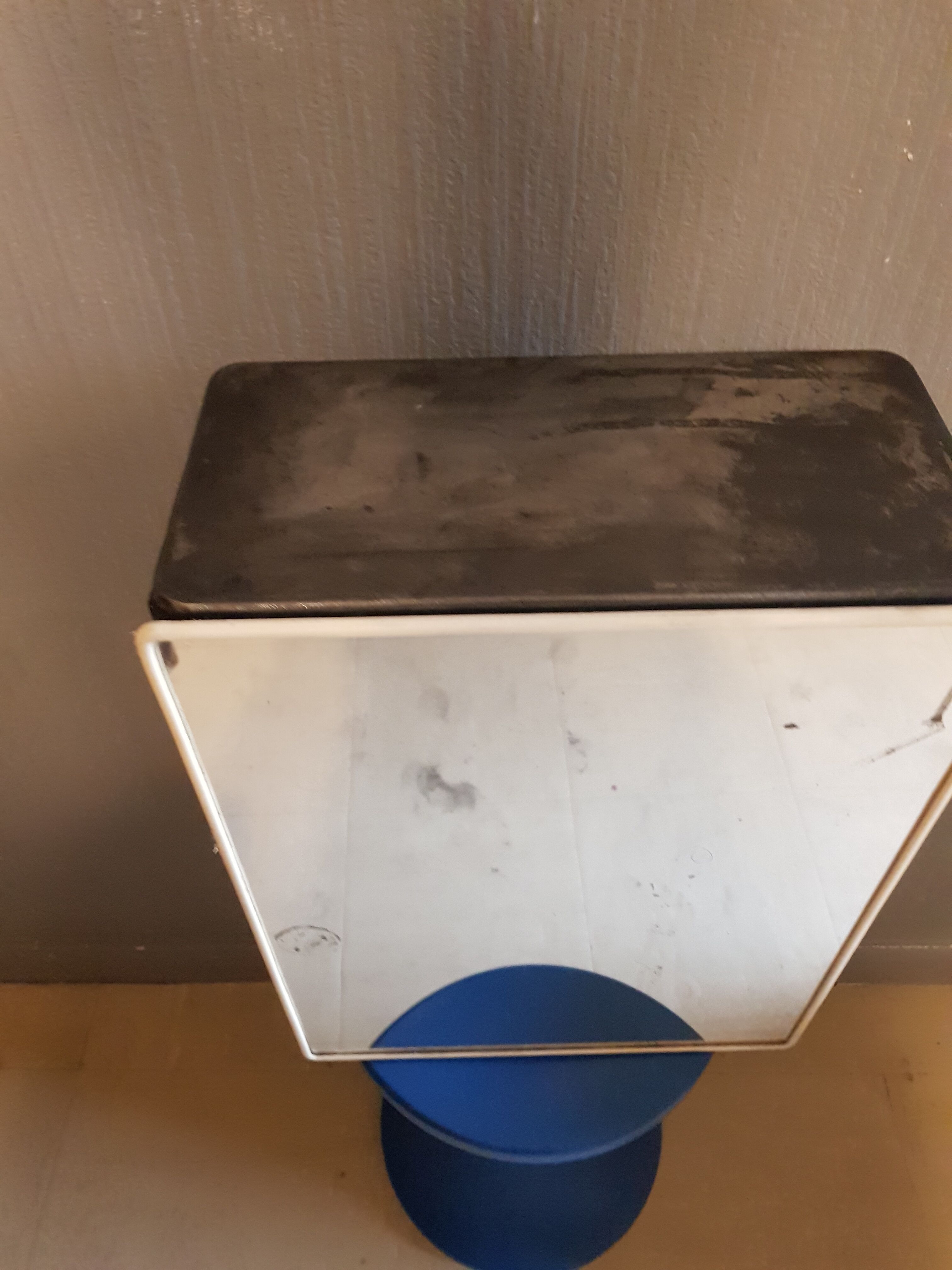 Vintage wax metal medicine cabinet.