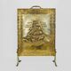 Fireplace screen in repoussé brass with a sailing boat. 1960s.