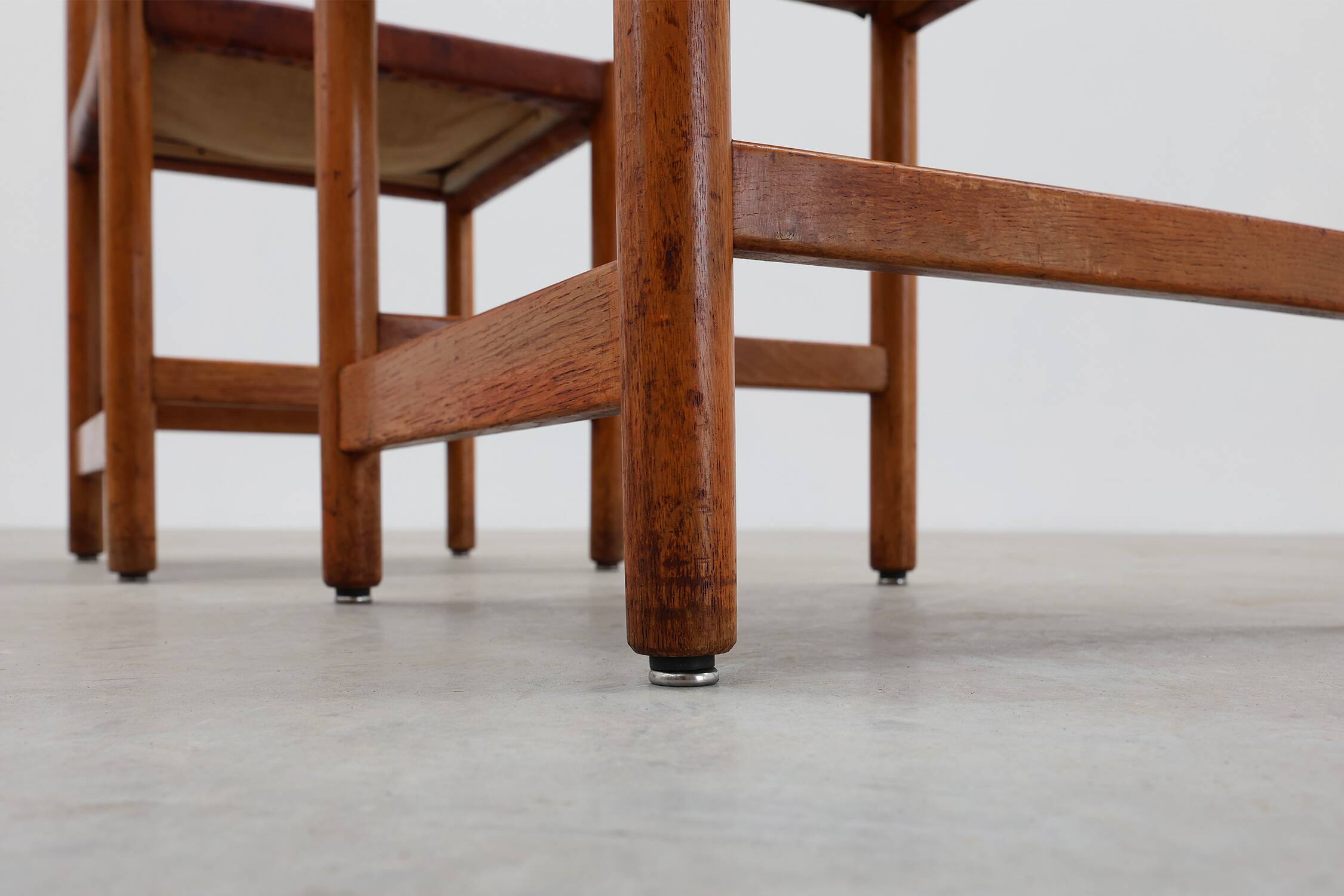 Pair of wood and leather Spanish chairs by Jordi Vilanova, ca. 1960