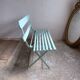 Former folding garden bench with wooden and metal slats
