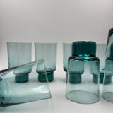 Eight bluish glass water glasses