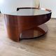 Italian Space Age coffee table in curved wood and smoked glass – 1970s