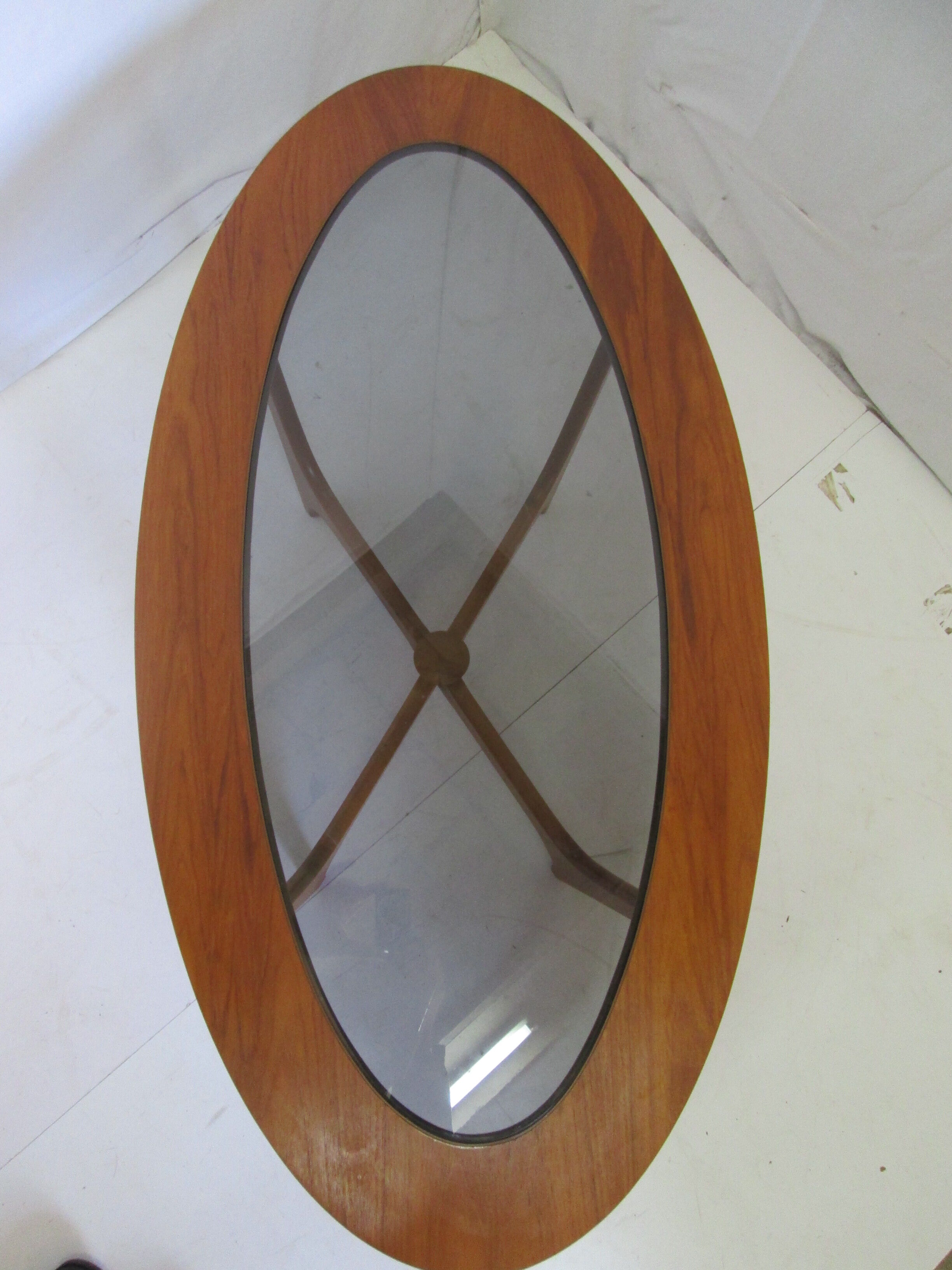 Oval teak coffee table