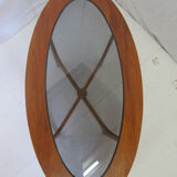 Oval teak coffee table
