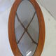Oval teak coffee table