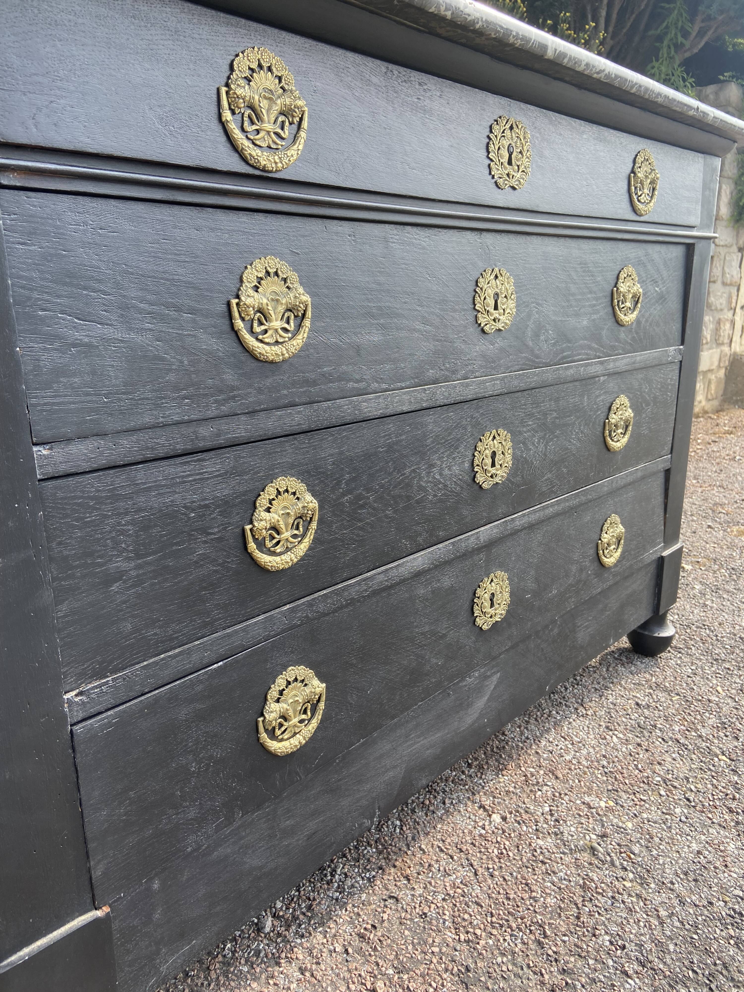 Old period chest of drawers black patinated