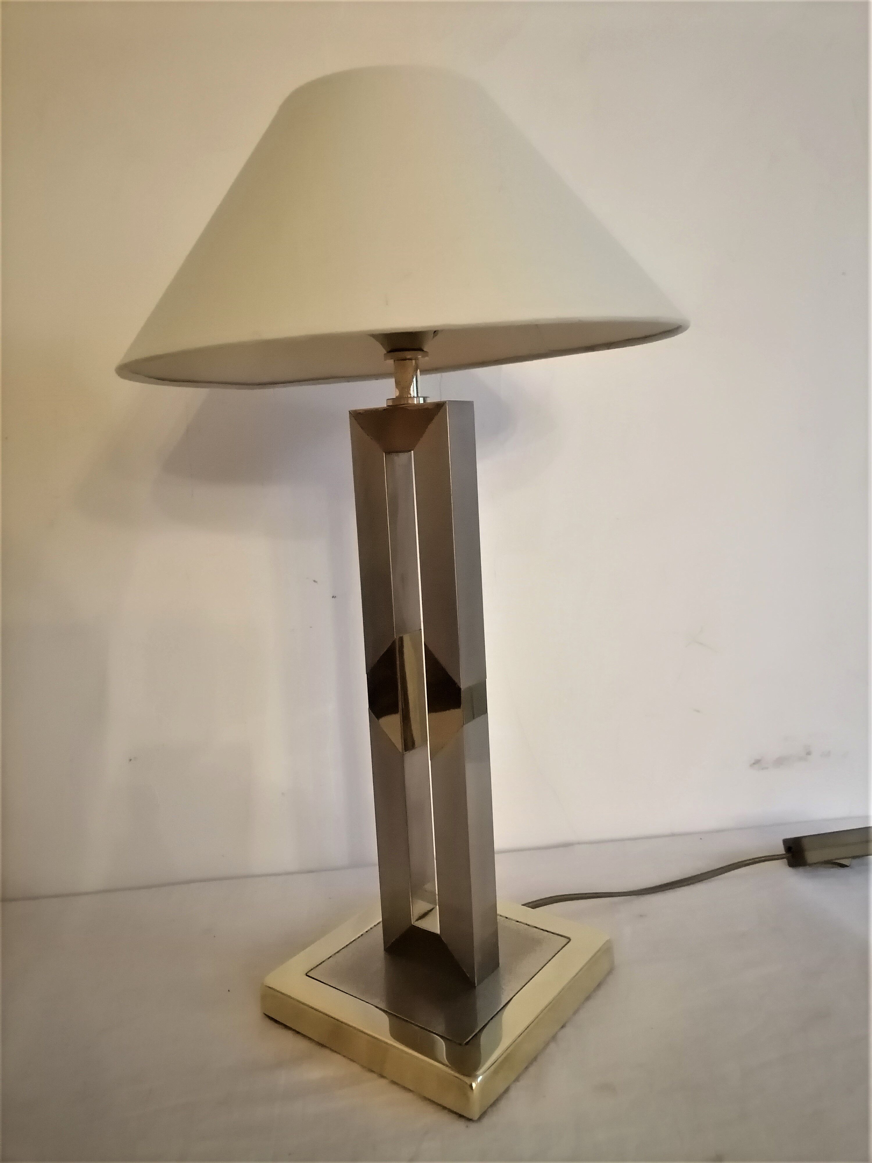 Modernist lamp. Brushed steel and brass.