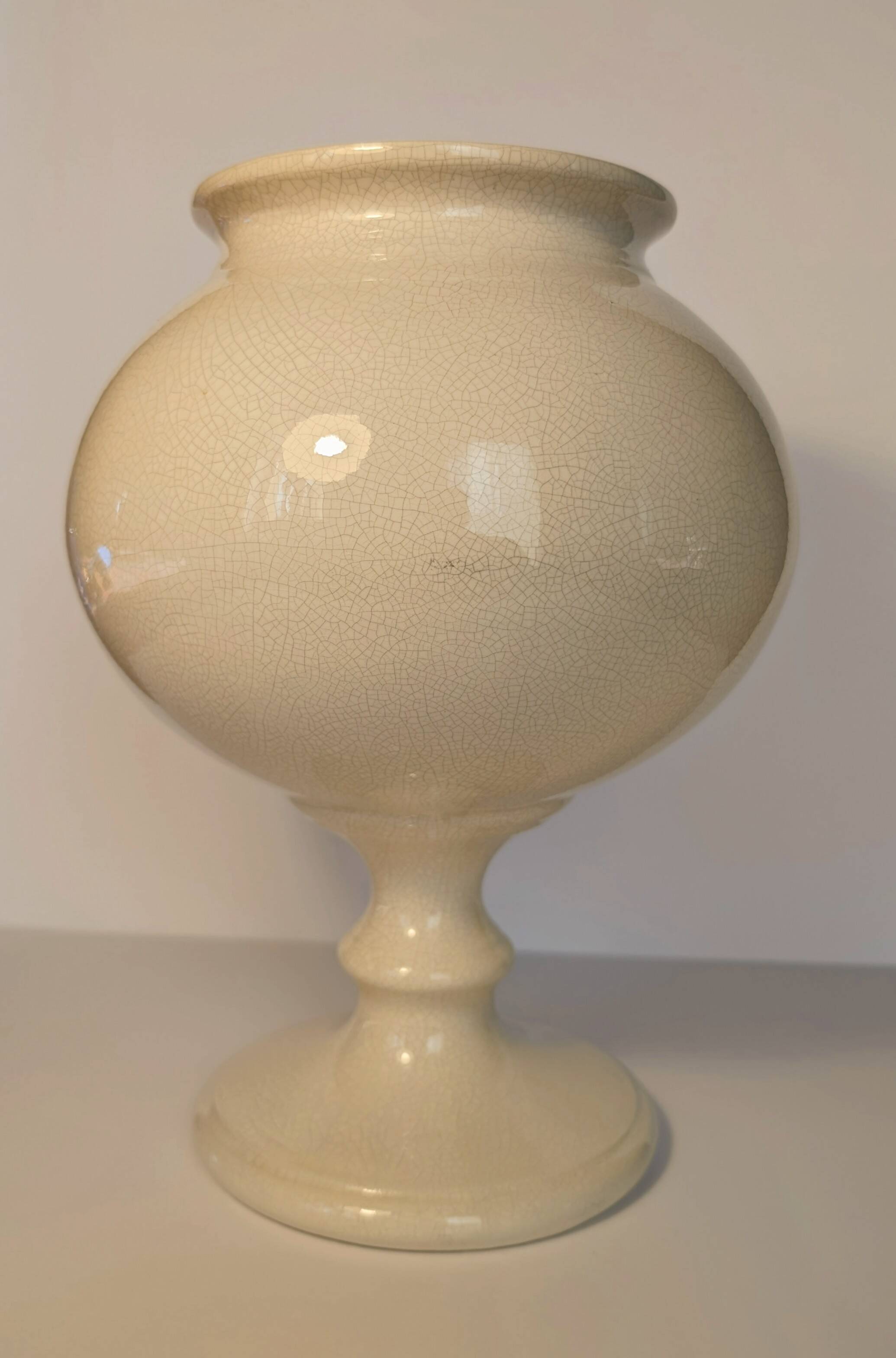 Cracked cream ceramic leech cup