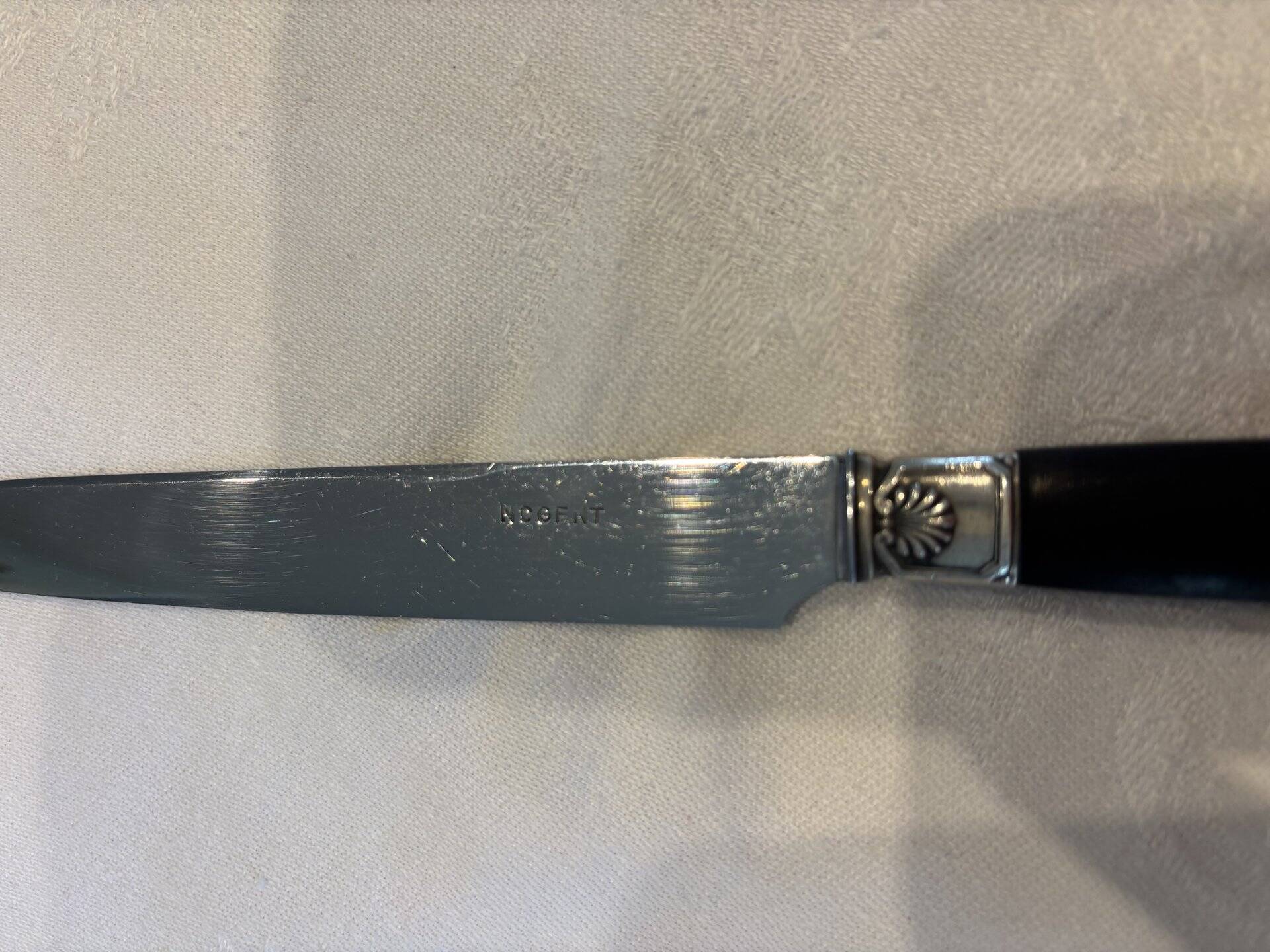 Empire-style knife set in ebony, with silver ferrules and pommels