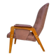 Vintage armchair in light brown faux leather, 1960s.