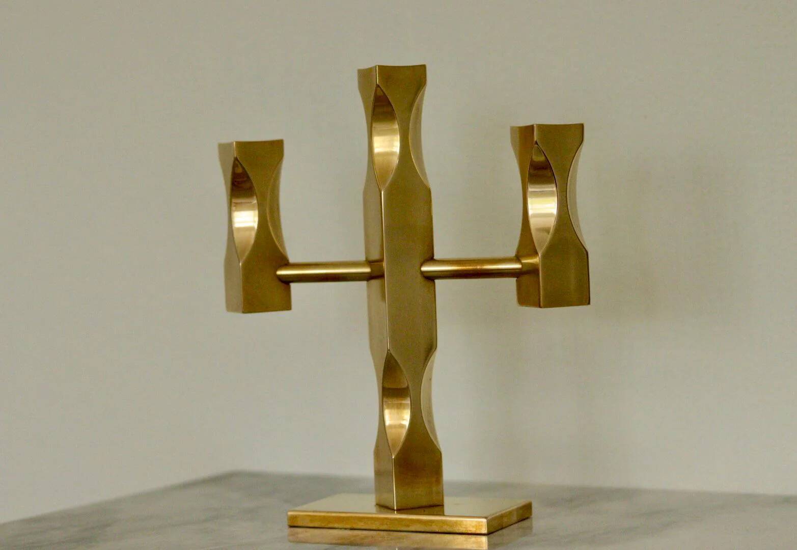 Swedish three-armed candelabrum in brass by Lars Åkesson for Vallonmässing
