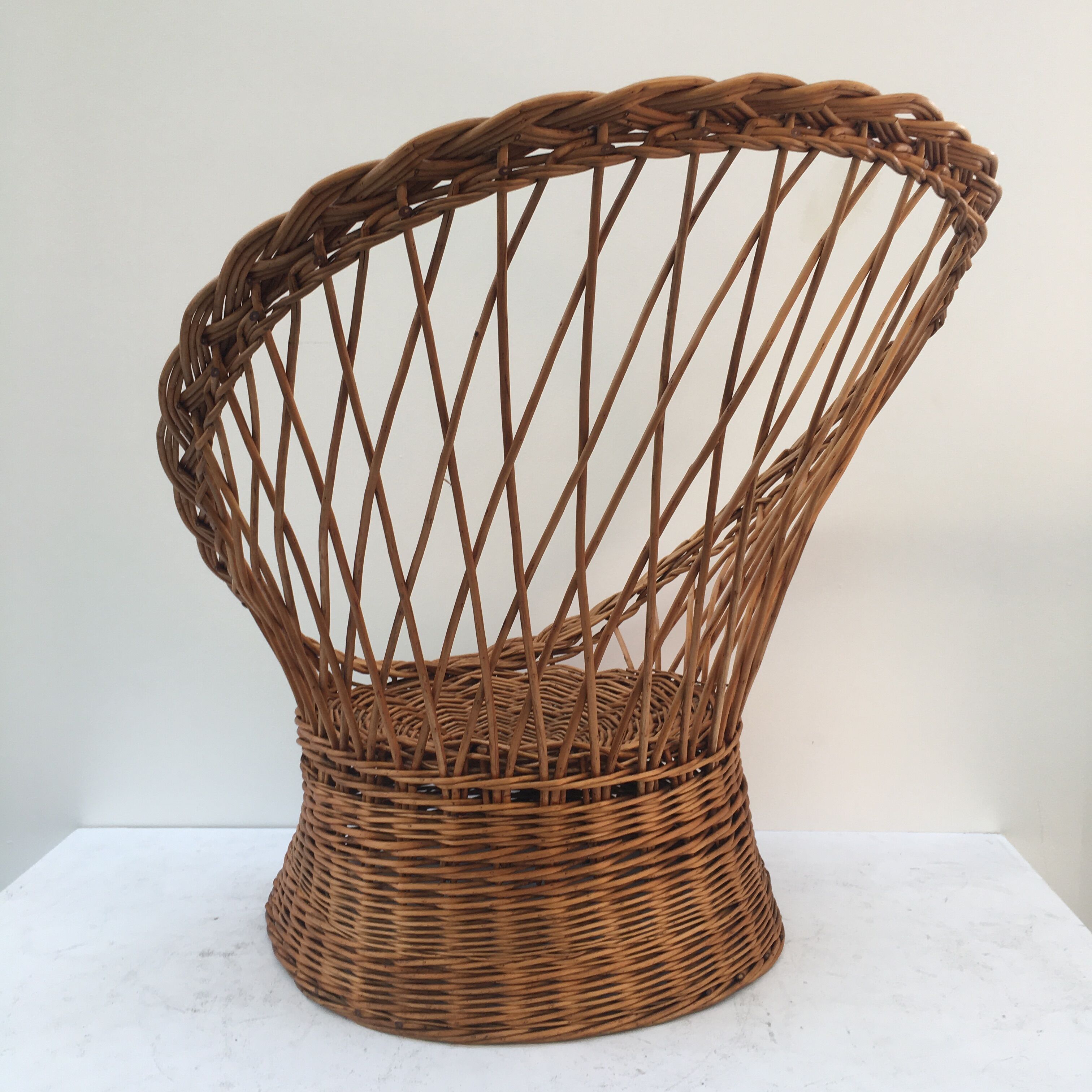 Braided wicker throne armchair