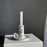 Small vintage hand-held candlestick in earthenware with green trim and floral decoration H10.5