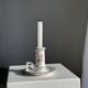Small vintage hand-held candlestick in earthenware with green trim and floral decoration H10.5