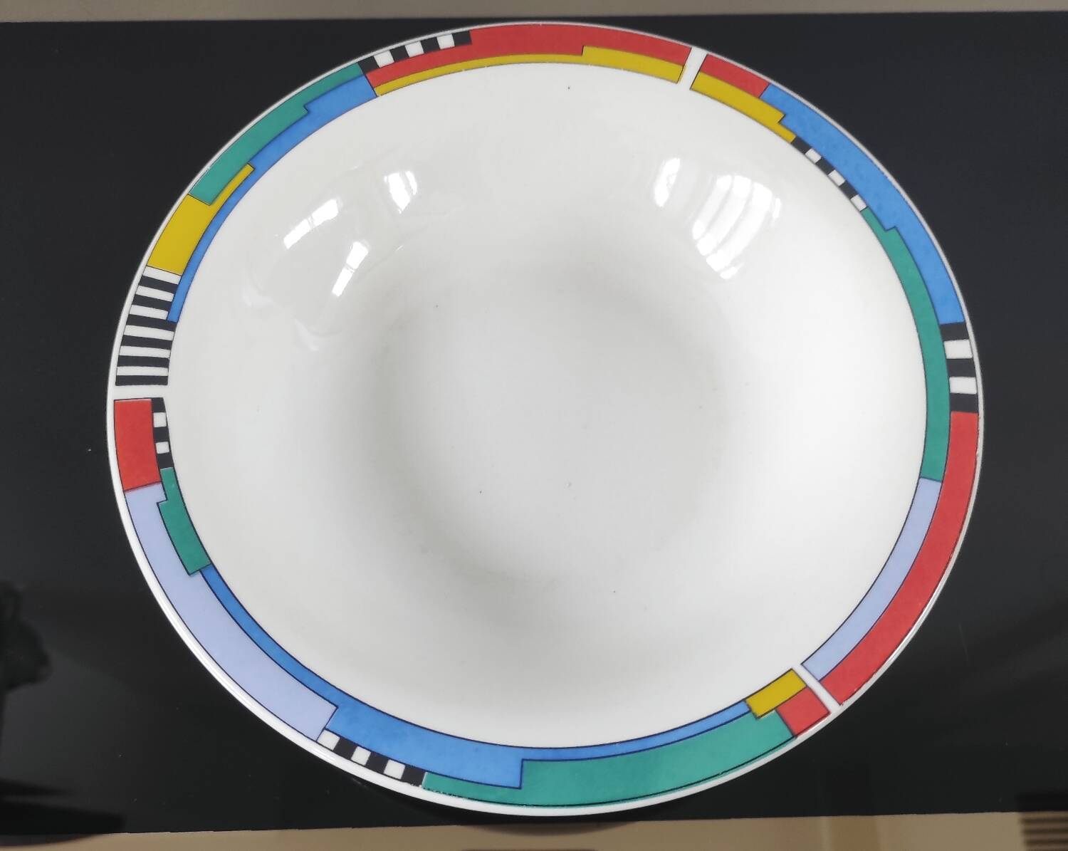 Set of 4 vintage Memphis style deep plates.