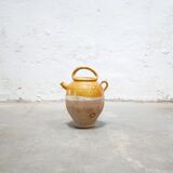 Old gargoulette pot in glazed terracotta