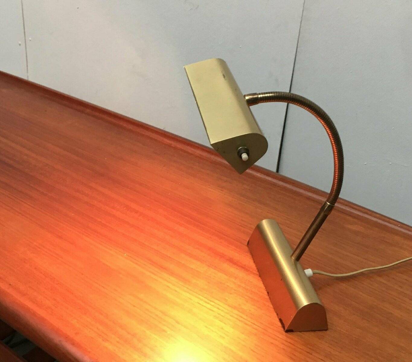 Mid-century brass swan neck table lamp in Hollywood Regency style from the 1960s.