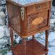 Bedside table in wood marquetry from the 19th century