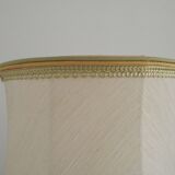 Table lamp with wooden base and fringed shade