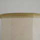 Table lamp with wooden base and fringed shade