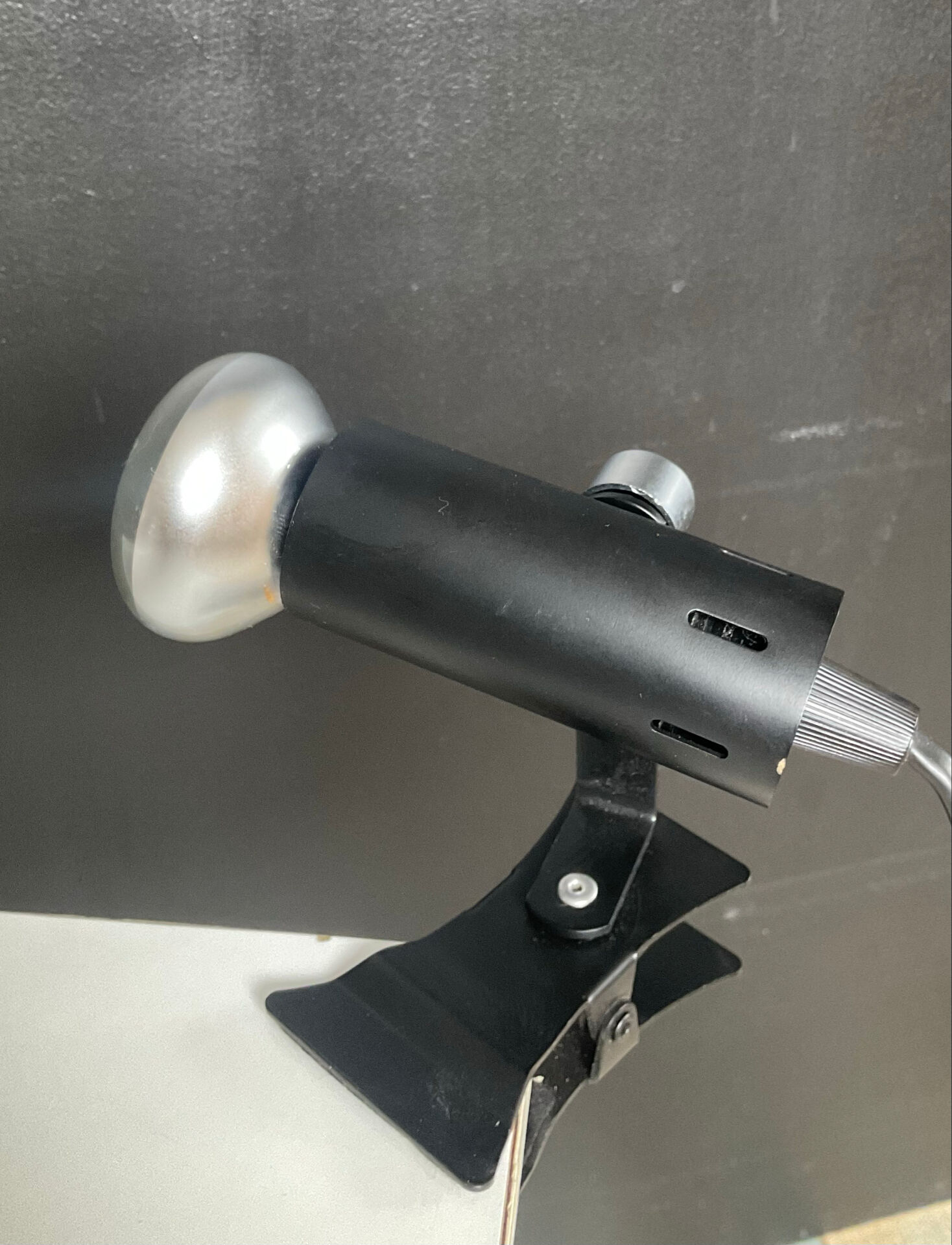 A pair of clamp lamps from the 1970s.