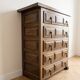 Antique solid wood chest of drawers with five drawers.