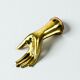 Bronze hand-shaped wall hook, gilded finish, Italy, 1970s