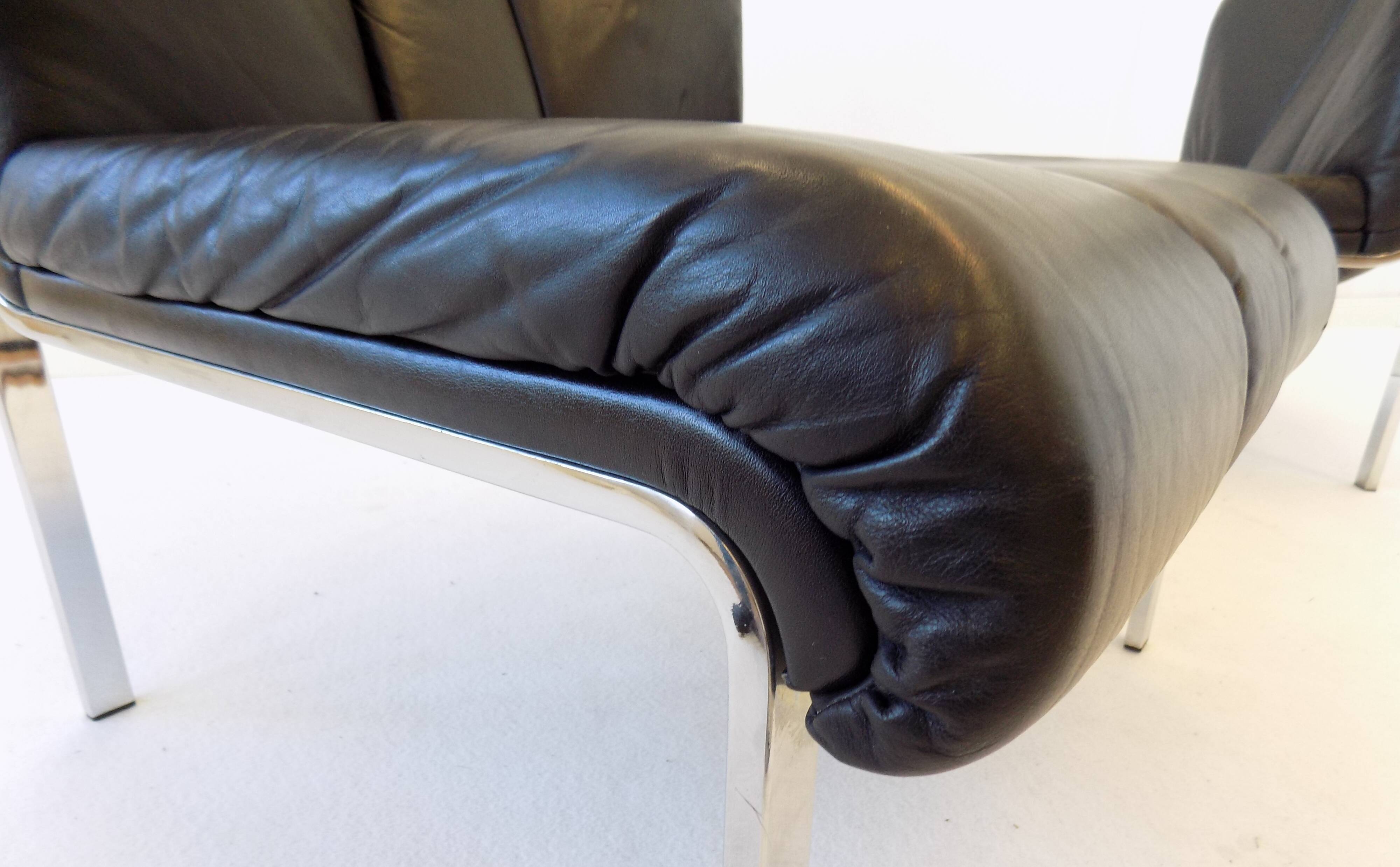 Girsberger Eurochair set of 2 black leather lounge chairs