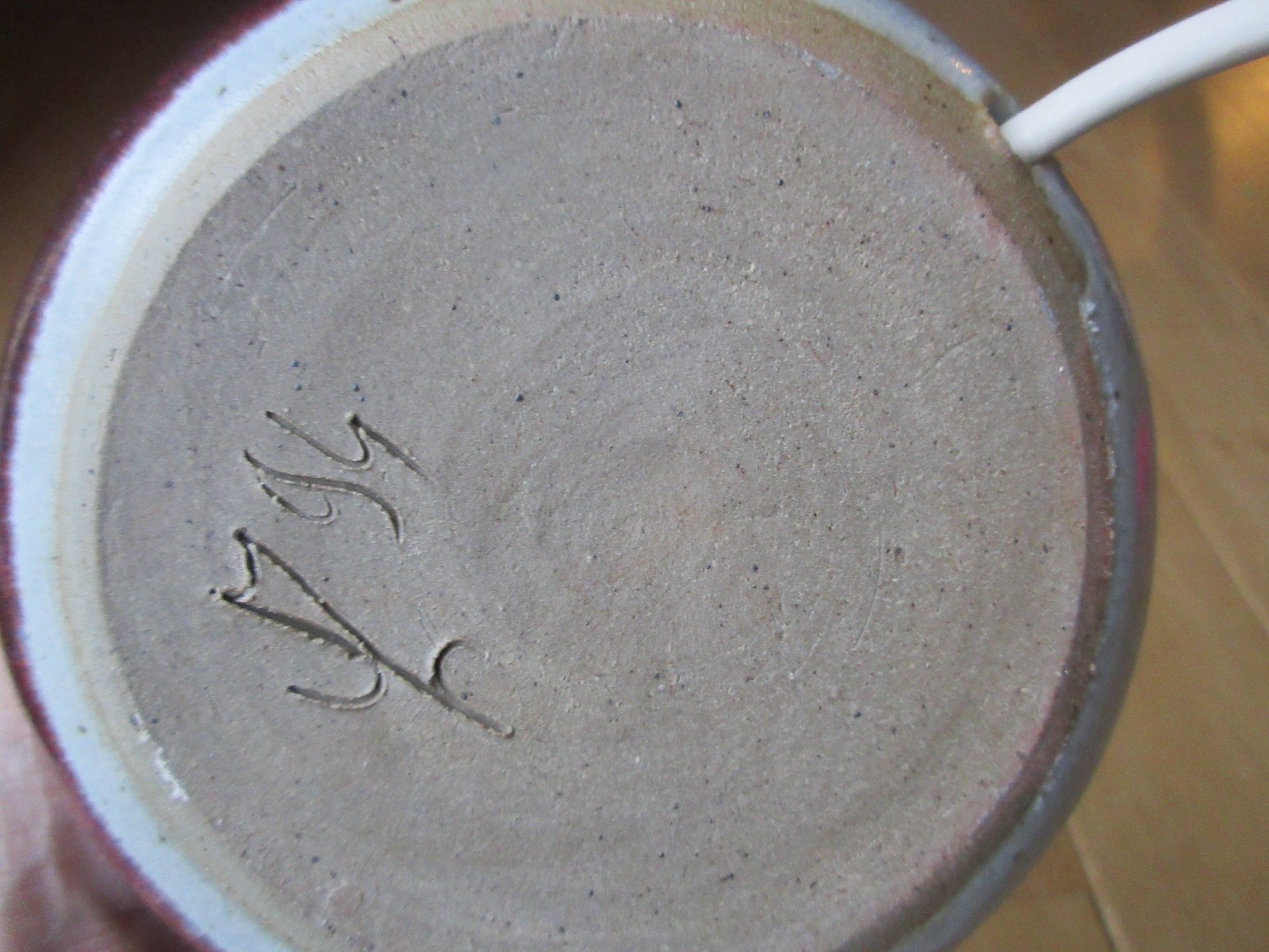 Grey sandstone lamp foot and wine lie