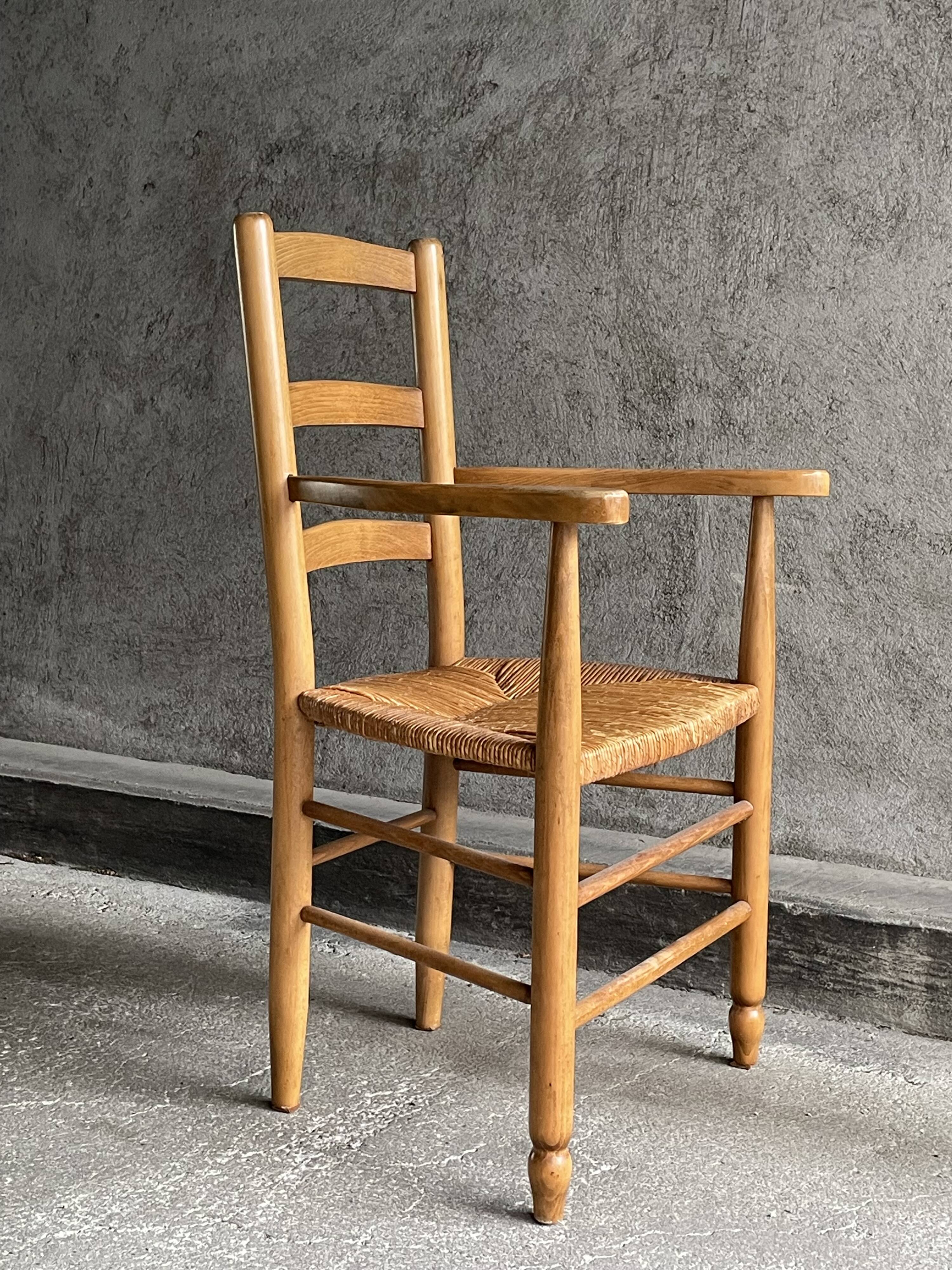 Straw chair with armrests, France
