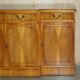 Vintage buffet made of mottled yew wood with three doors and four drawers.