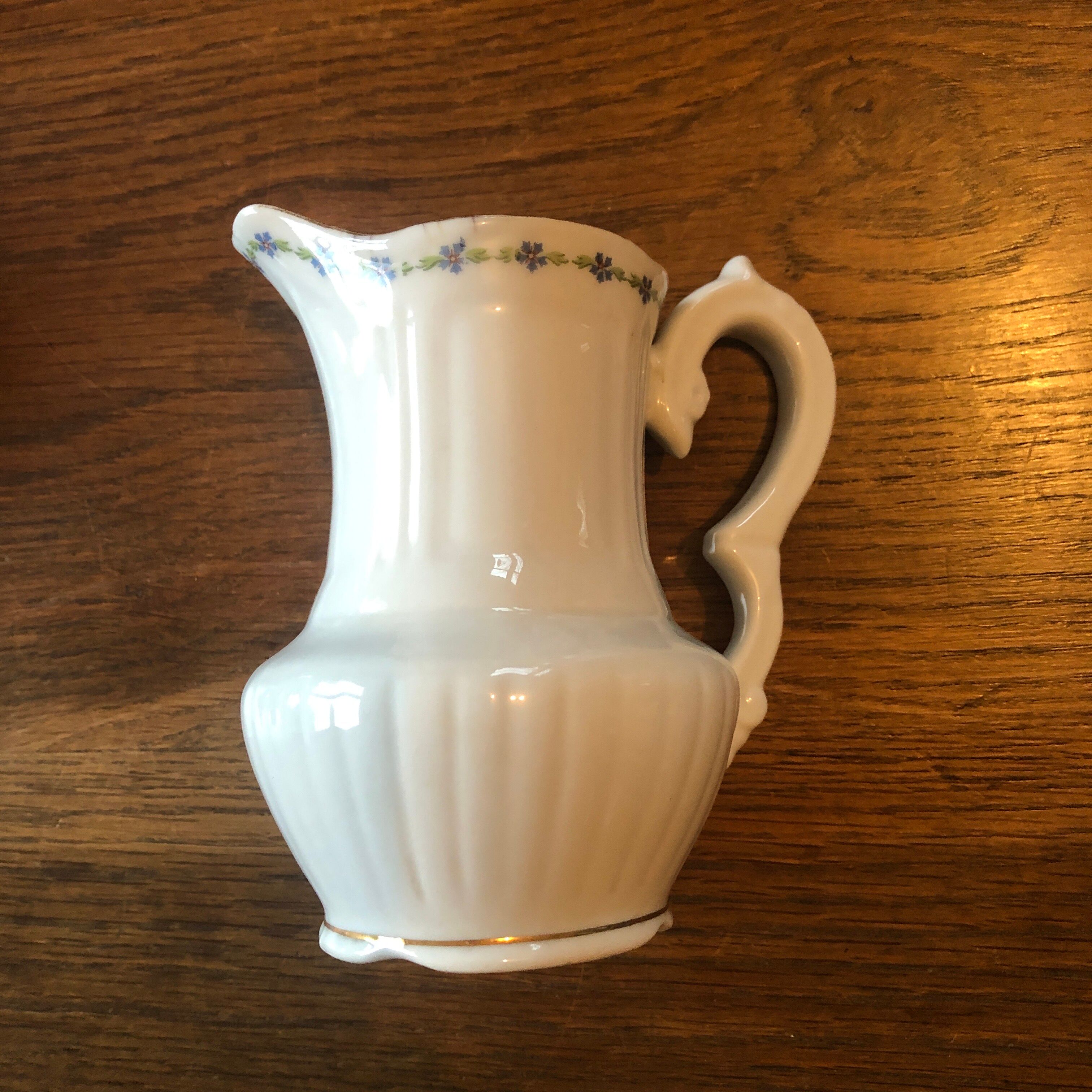 Old milk jug limoge