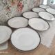Lot de 9 assiettes creuses en porcelaine de Limoges Haviland frise florale bleu nuit et or