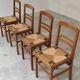 Set of 4 designer oak and straw chairs from the 1950s