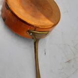 Lots of tinned copper kitchen utensils