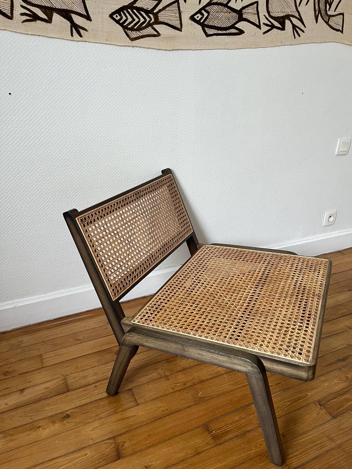 Vintage wooden and cane armchair