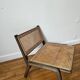 Vintage wooden and cane armchair